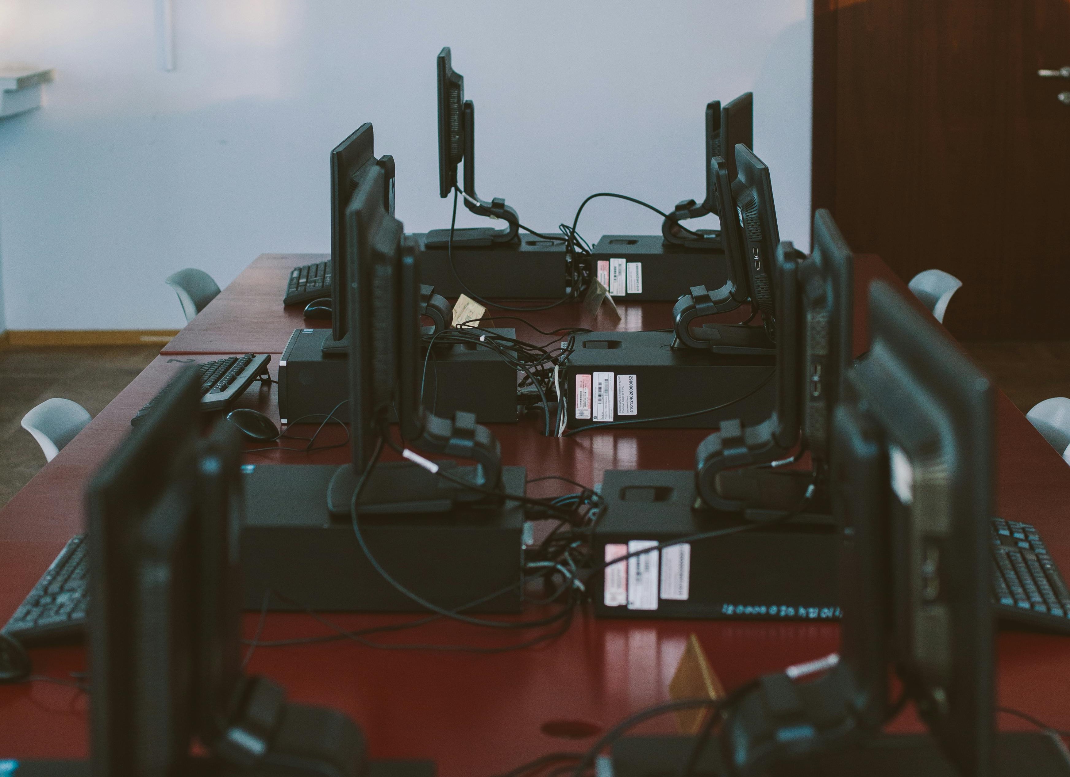 Photo by Polina Zimmerman: https://www.pexels.com/photo/photo-of-computers-on-red-table-3747480/